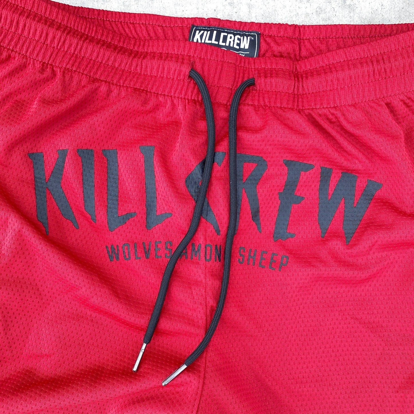 RELAXED CUT WOLVES SHORTS - RED