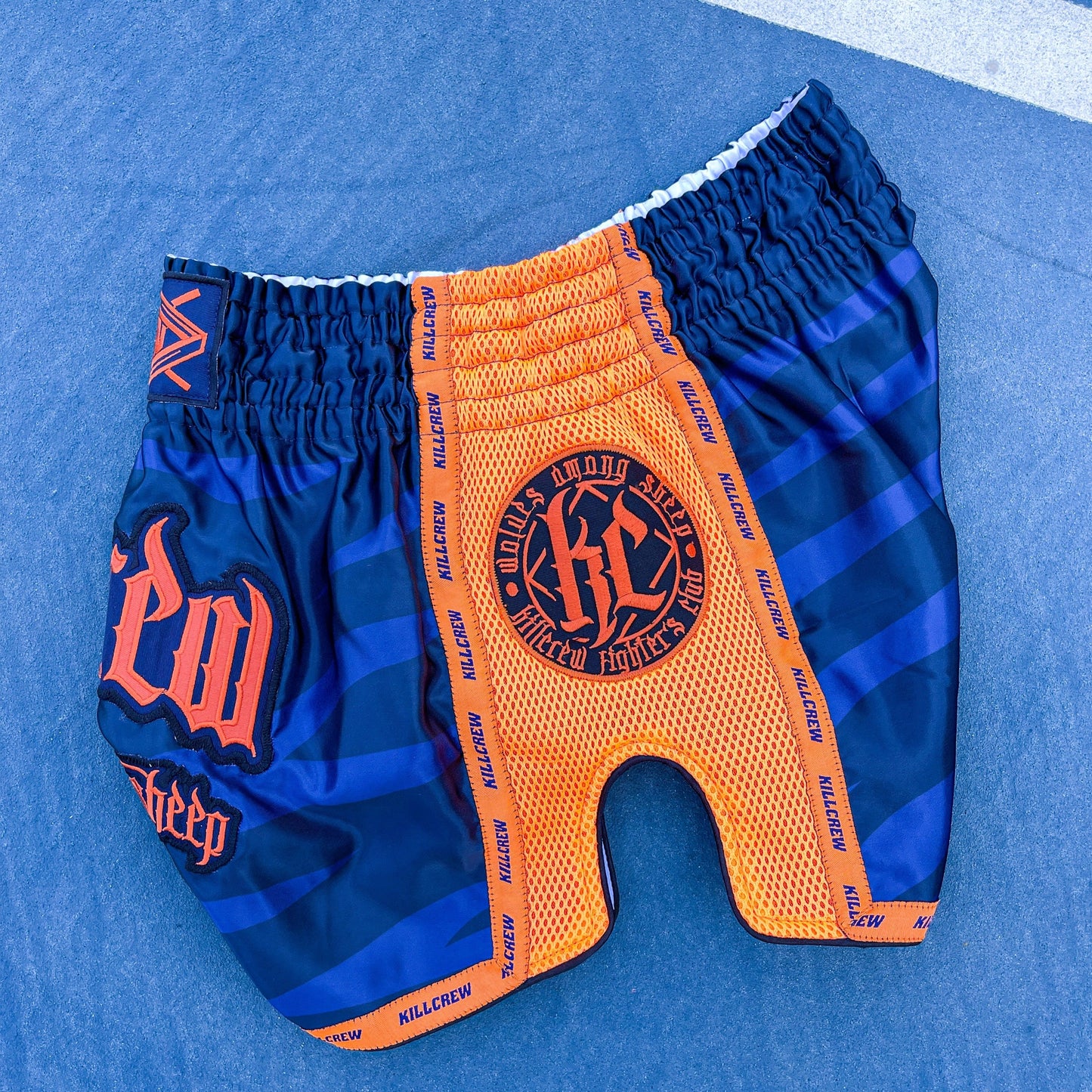MUAY THAI FIGHT SHORTS - TIGER ORANGE / BLUE