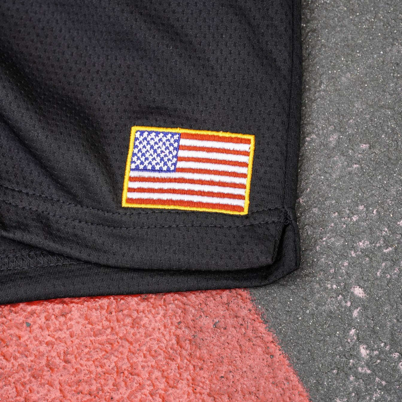 RELAXED CUT EMBROIDERED FLAG SHORTS - BLACK