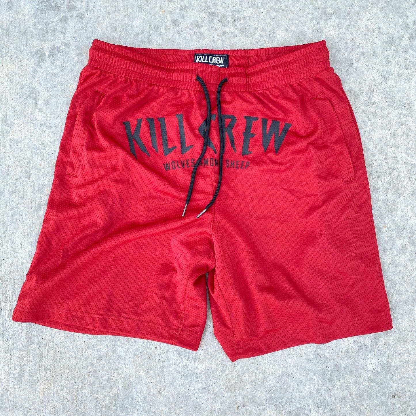 RELAXED CUT WOLVES SHORTS - RED
