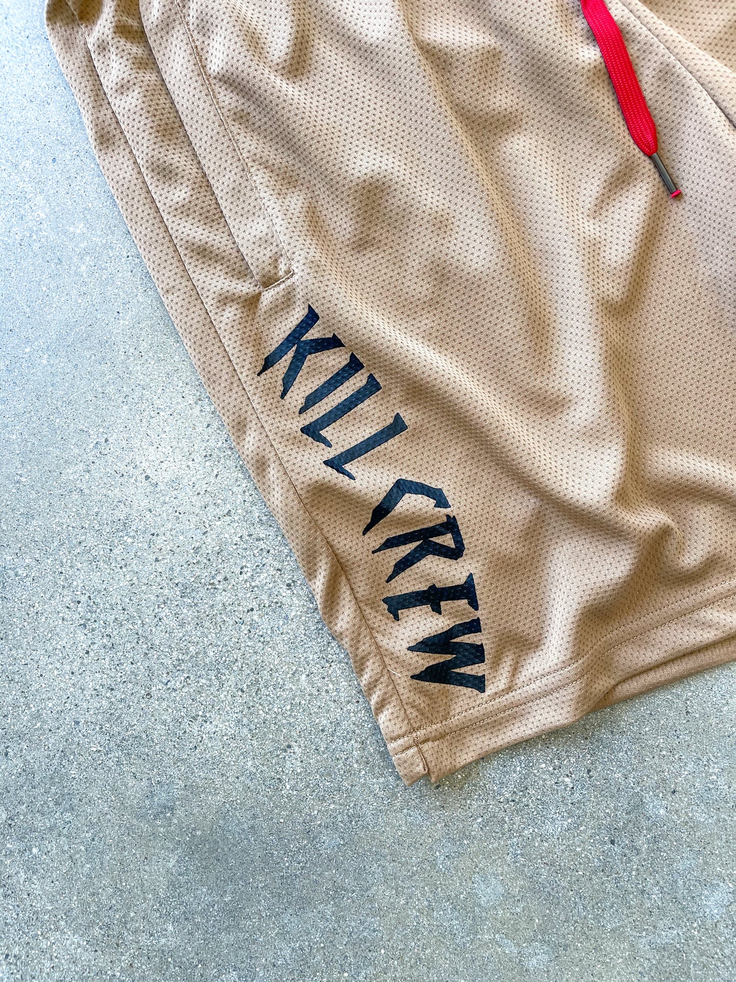 RELAXED CUT EMBROIDERED FLAG SHORTS - SAND