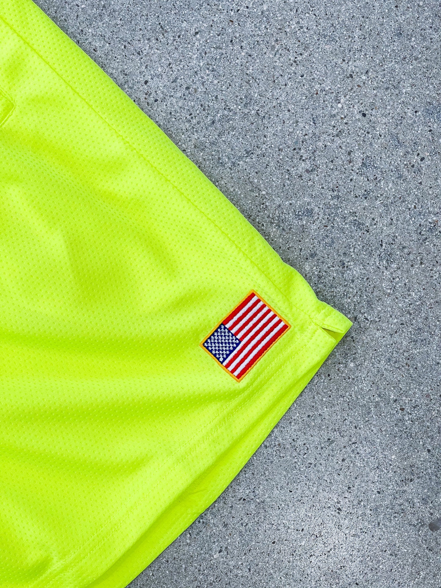 RELAXED CUT EMBROIDERED FLAG SHORTS - NEON YELLOW